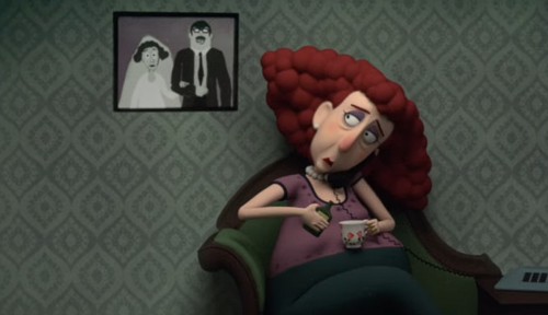 woman slouches against wll