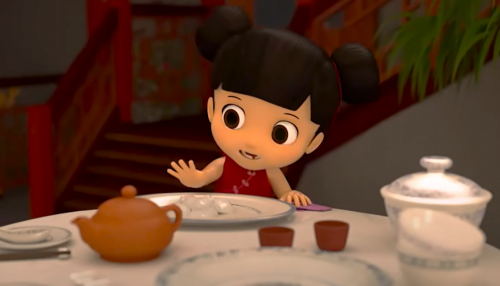 little girl reaching across table